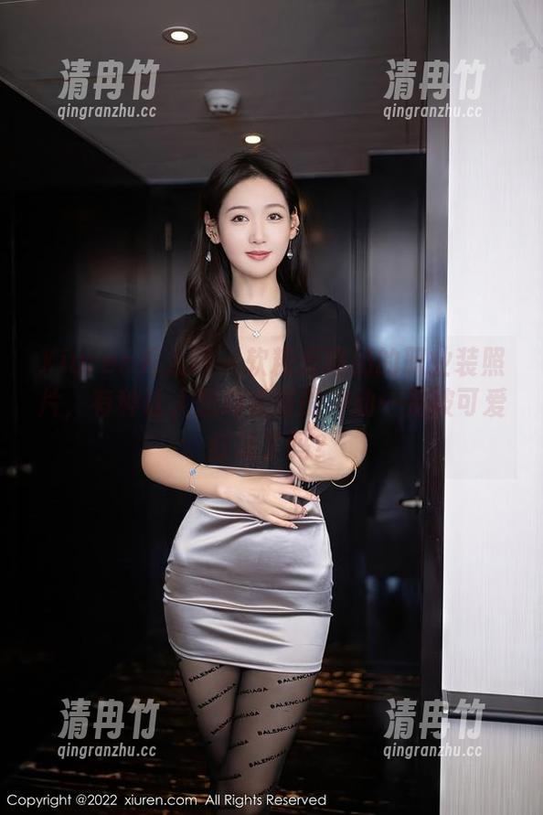 Xiuren秀人网 - 软糖爱喝奶的职业装照片，有种让人想喝奶茶的冲动…是被可爱打动了吗？